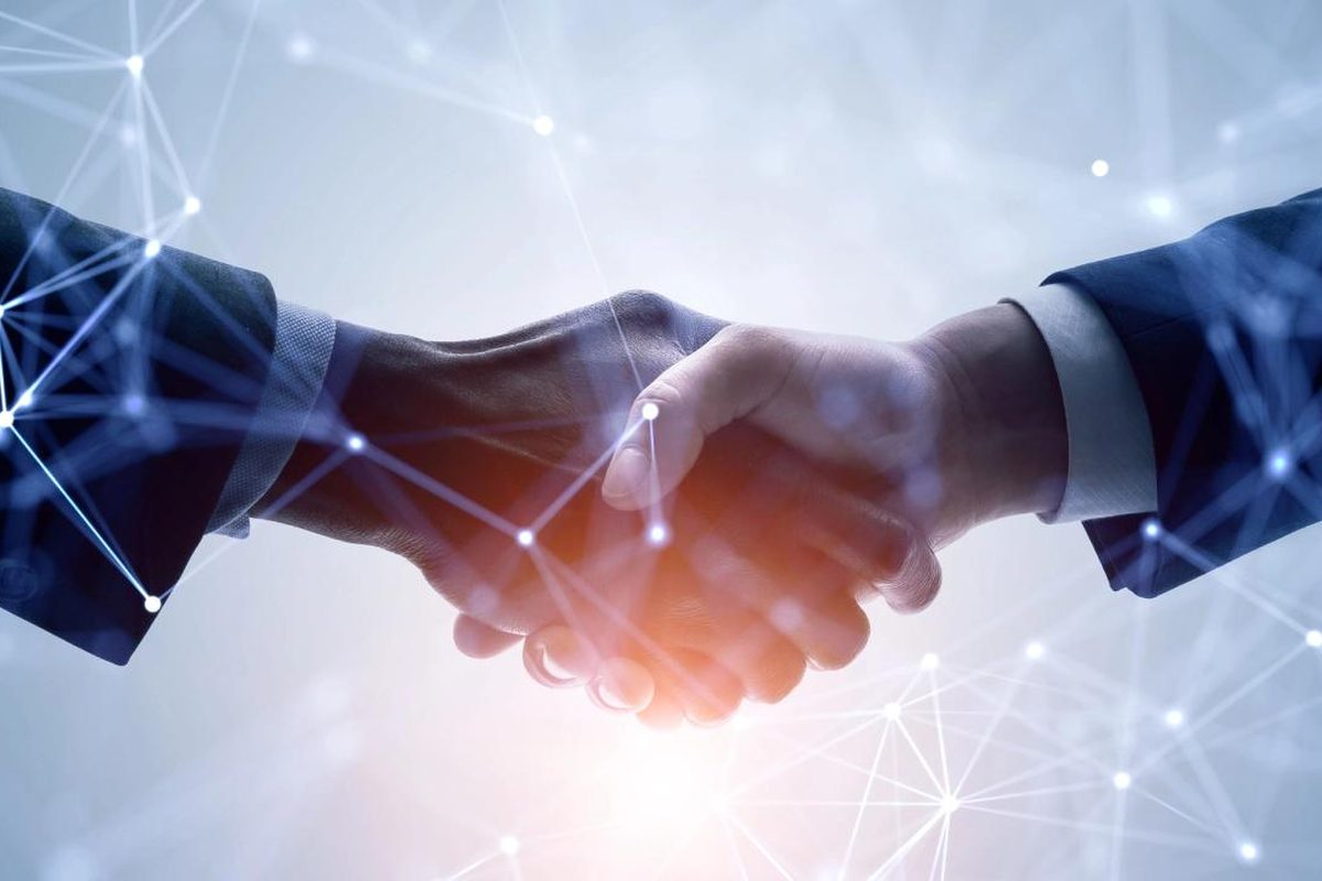 Handshake over a network graphic, representing expert collaboration