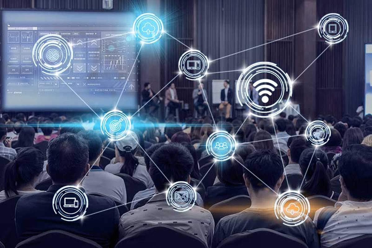 Conference audience with connected network icons